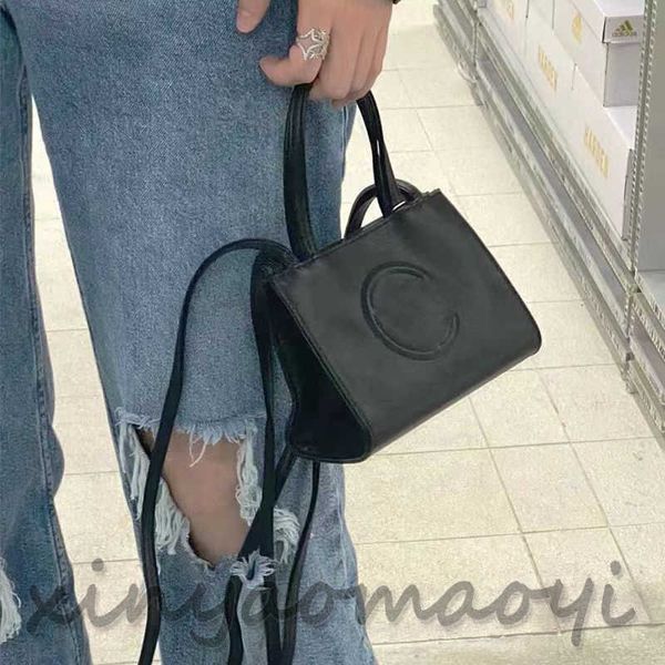 Mochila de designer, bolsa de nicho simples de cor sólida, bolsa Tote, bolsa crossbody, bolsa de ombro, bolsa clutch, logotipo CT completo, bolsa Tote pequena simples e moderna