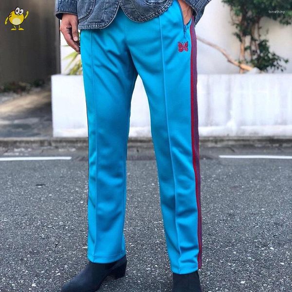 Pantaloni da uomo Primavera Autunno Pantaloni sportivi Uomo Donna Aghi Fettuccia rossa Ricamo farfalla a righe Coppia casual Pantaloni blu