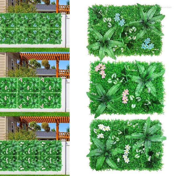 Декоративные цветы искусственные изгороди из хеджирования зеленых листьев зелени из искусственных панелей.