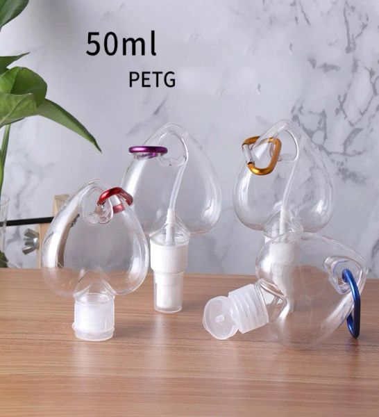 Großhandel leere nachfüllbare Kunststoff-Alkoholflasche mit Liebesherz, 50 ml, durchsichtige, transparente PET-Händedesinfektionsflaschen mit Schlüsselringhaken