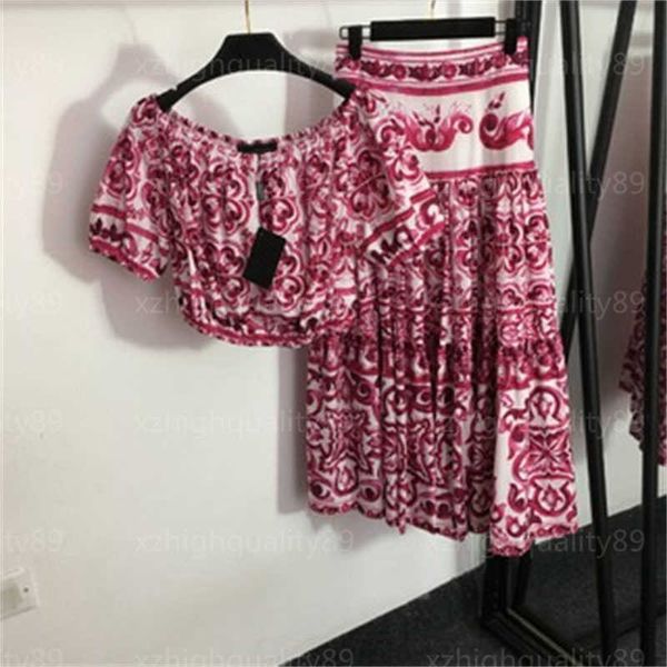 Conjunto feminino de duas peças camiseta tops saias vintage estampado um pescoço manga curta top cintura alta bainha grande meia saia vestido curto de duas peças roupas de grife