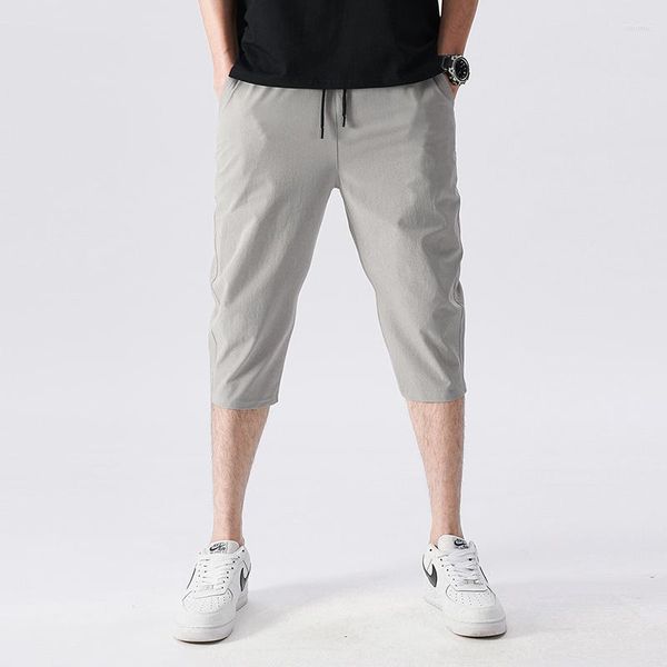 Мужские шорты корейская версия Summer Slim Fit Маленькие спортивные брюки для отдыха мальчики из шелкового шелка быстро сушка с 7 очками.