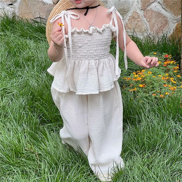 Set di abbigliamento Bambini coreani Set per bambini Ragazze Summer Cotton Organic Tie Tank Sling Smocked Top Lace Wide Leg Pants Pantaloni Outfit 230728