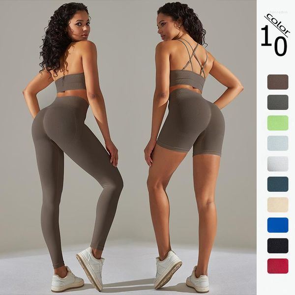 Set attivi Leggings in tinta unita Beautiful Back Tuta da yoga ad alta elasticità Set da quattro pezzi Reggiseno sportivo da corsa Pantaloni da fitness per le donne