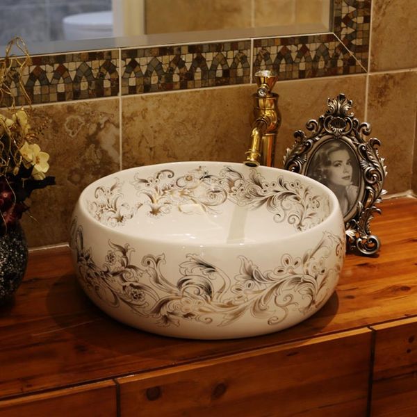 Pias de lavatório de arte em cerâmica estilo vintage europeu Lavatório de bancada para banheiro Vaidades pias de vaso de cerâmica de furo único296z