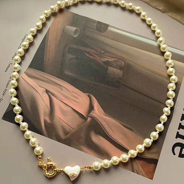 Saturn Pearl Heart nceklace Женщина роскошная дизайнер -дизайнерские дровки 14 тыс. Желто -золото, покрытая цепью Love Hearts Vvs Подвесные ожерелья