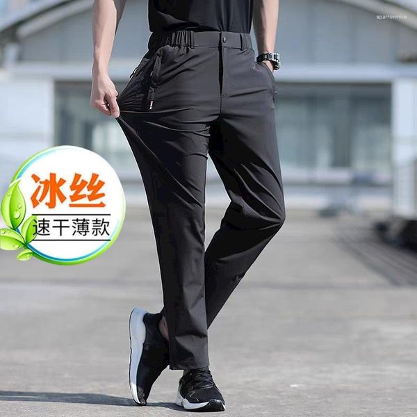 Pantaloni da uomo di grandi dimensioni Summer Ice Silk Stretch traspirante Gamba dritta 8XL Pantalone nero con fascia elastica ad asciugatura rapida