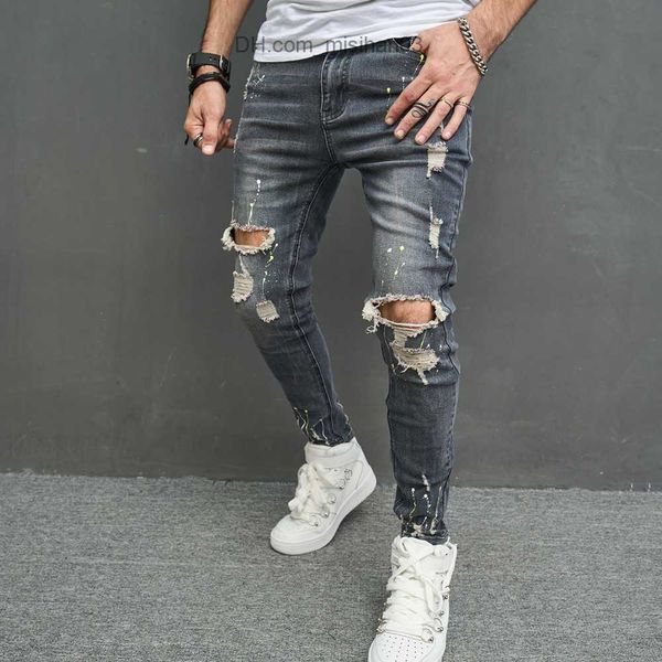 Pantaloni da uomo Nuovi jeans a matita attillati da uomo street abbigliamento da uomo fori hip-hop pantaloni in denim ultrasottili elastici Z230731