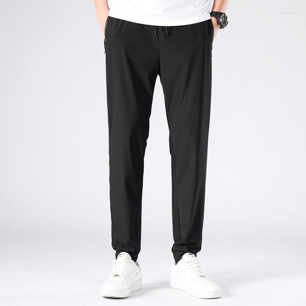 Мужские брюки плюс размер 8xl сплошной карман лето -повседневное простые спортивные спортивные