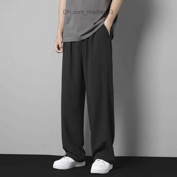 Pantaloni da uomo Pantaloni di seta di ghiaccio Pantaloni estivi da uomo Tendenza da uomo Pantaloni larghi dritti e sottili Pantaloni sportivi da jogging Pantaloni da uomo hombre Z230801