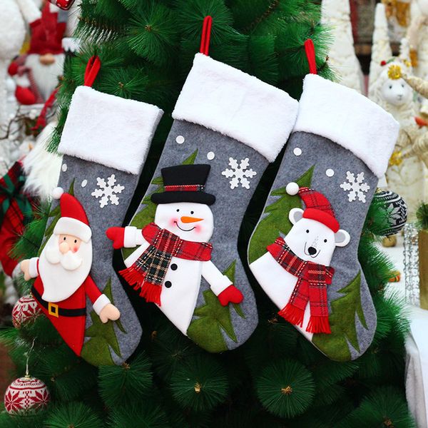 Tessuto decorativo natalizio Pupazzo di neve tridimensionale di Babbo Natale decorato con borsa regalo calza natalizia con testa di calza bianca