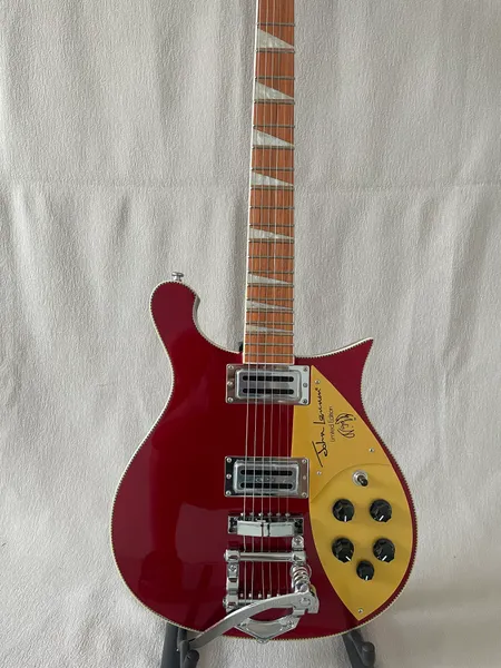 Rote 660 E-Gitarre, Korpus aus schwarzer Linde, Griffbrett aus Palisander, Hals, großes Vibrato, transparent