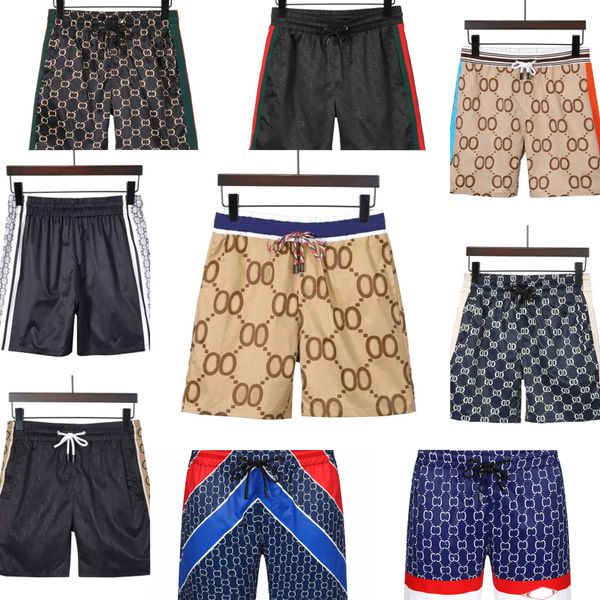 Pantaloncini da uomo estivi Designer Casual Sport 2023 Moda Asciugatura rapida Pantaloni da spiaggia da uomo Stampa di lettere in bianco e nero Breve taglia asiatica M-XXXL