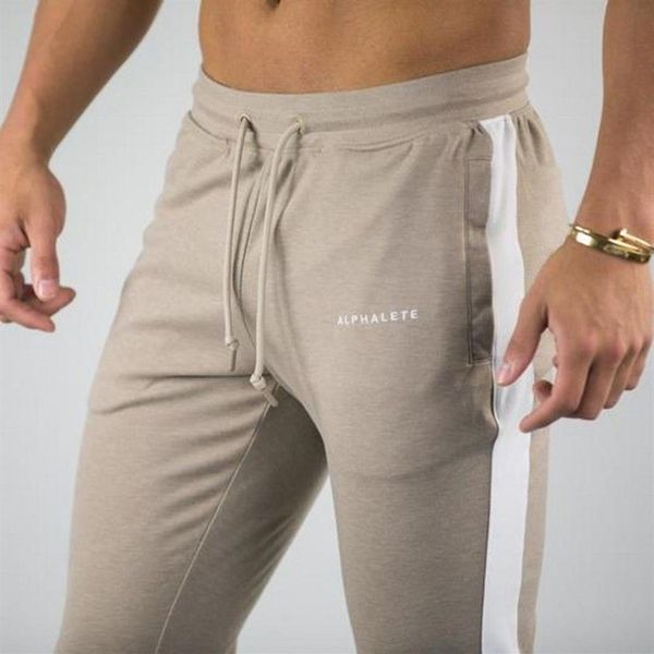 Alphalete Marka Sonbahar Kış Fitness Erkek Spor Salonu Pantolon Moda Pamuk Kalem Pantolon Vücut geliştirme Pantolonlar Yüksek Kalite Jogger251v