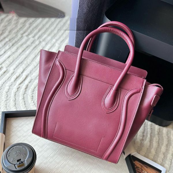 Luxus -Tasche klassische Handtasche Einkaufsdesigner Taschen Echtes Leder Lächeln Gesicht Tasche Trapez Cross Lod Bag zwei Größe für Ihre Option22