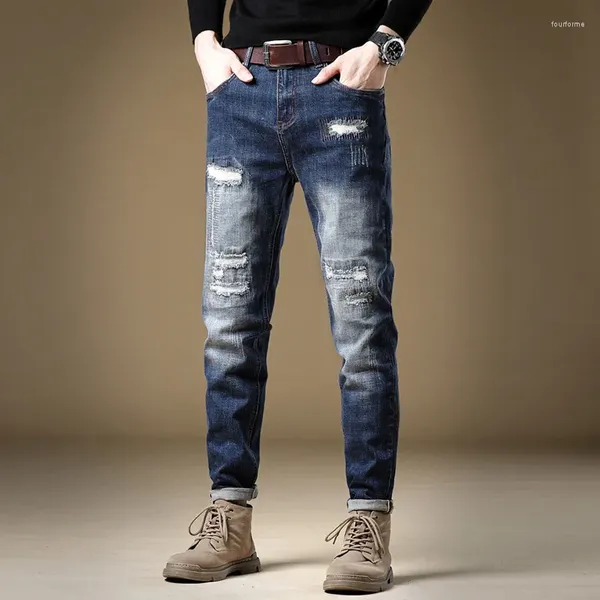 Jeans da uomo primavera e autunno comodi pantaloni in denim dritti con foro graffiato alla moda di marca pesante Xintang Men