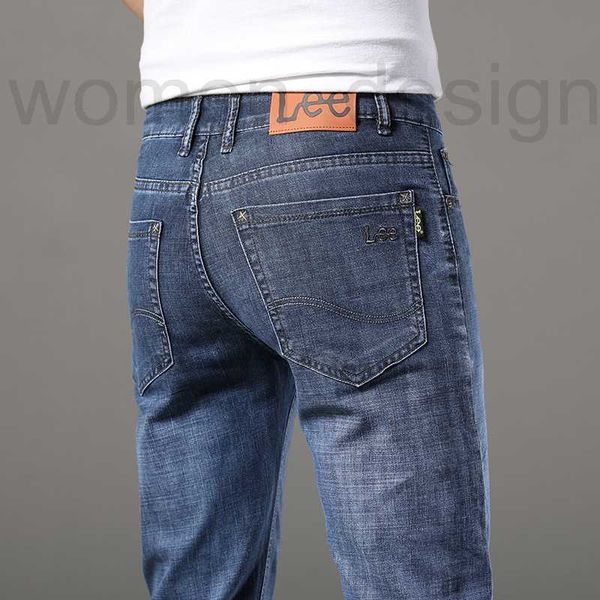 Jeans masculinos designer de luxo primavera / verão azul fino ajuste pés pequenos calças finas coreanas Le Label KHF4