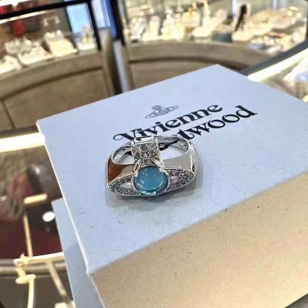 Designer Vivienen Westwoods Jóias Anéis Novo Western Aqua Blue Saturn Transit Bead Anel de alta qualidade Terra Planeta Glass Bead Ring 7 Eve Gift 2024