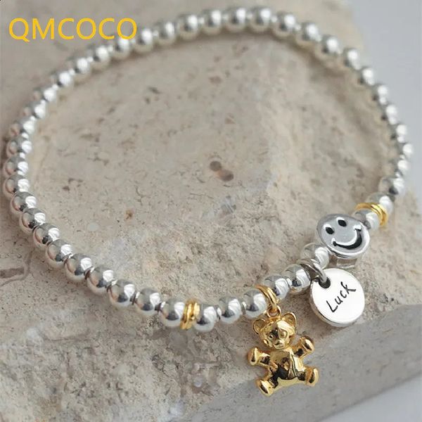 Braccialetti con ciondoli QMCOCO Unico creativo Colore argento Ciondolo rotondo Sorriso Faccia Orso Bracciale con perline Donna Moda coreana Ornamenti a mano 231102