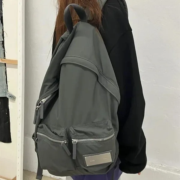 Sacos escolares Coréia do Sul Handpack Mulheres 2023 Estudante Schoolbag Casual Grande Capacidade À Prova D 'Água Nylon College Style Fashion Backpack