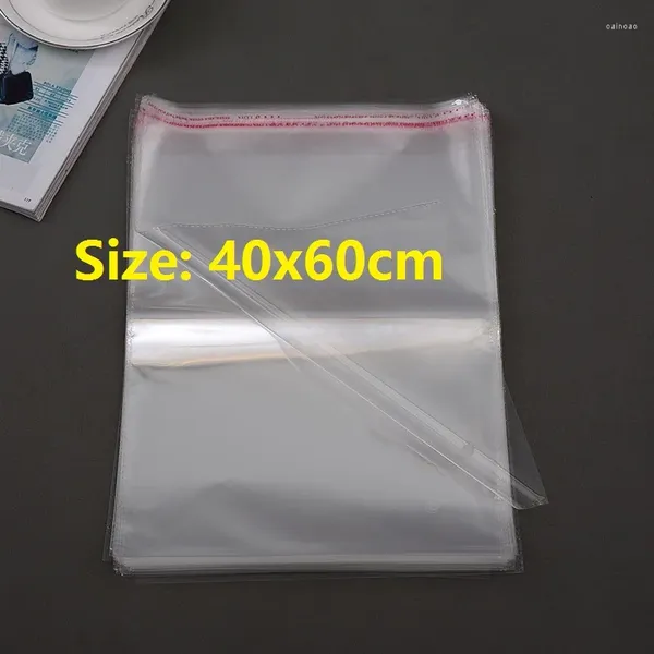 Confezione regalo 100 pezzi all'ingrosso 40 60 cm sacchetto OPP trasparente richiudibile in cellophane/BOPP/sacchetti in polietilene sigillo adesivo per imballaggio trasparente