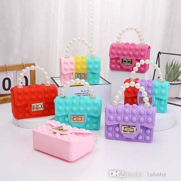 2023 Bolsas infantis por atacado Childern Mini Bags Mulheres designers de designers Bolsa Baby Presens Candy Color Jelly Bag