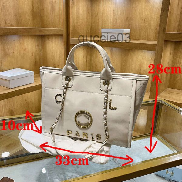 Çanta Tasarımcısı CC Çanta Çanta Plaj Crossbody Tote Omuz Çantası Luxurys Moda Markaları Erkek Kadın Beyaz Patent Deri Elergi Makyaj Kova Çantası