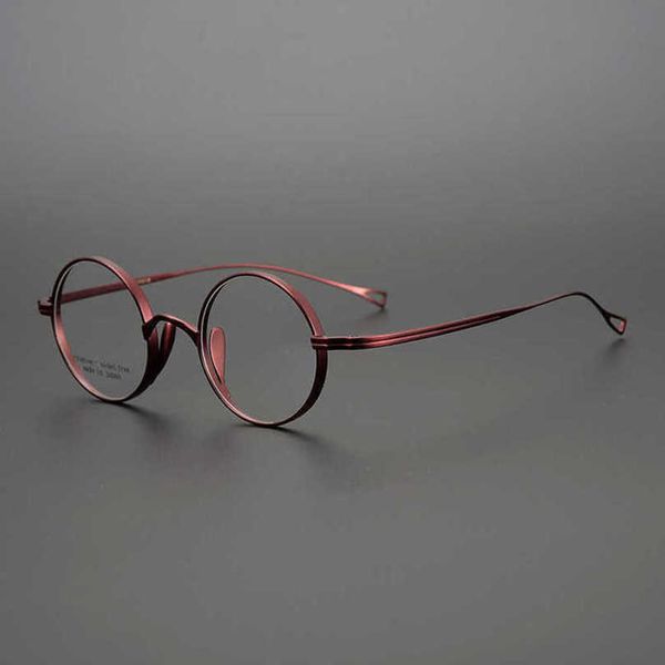2023 Модельер Новые солнцезащитные очки Японская коллекция Джона Леннона в той же круглой кадре в стиле Китая, чистые титановые очки Ультрал.