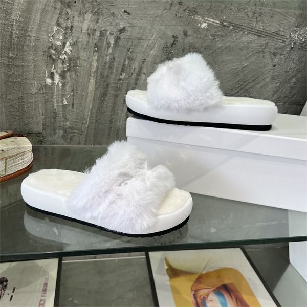 Chinelos Woolskin Sheepskin Insole Slides Sandálias Flat Slipper Designers Mulheres Soft Winter Luxury Plush Fur Oran Borracha Sola Decoração de logotipo de metal na parte superior