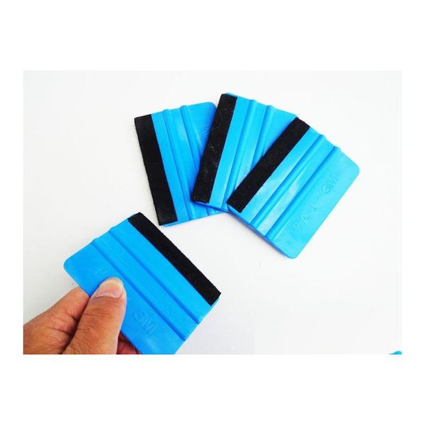 Andere Pflege-Reinigungswerkzeuge Auto-Vinylfolienverpackung Blaue Farbe Schaber-Rakel mit Filzkantengröße 10 cm x 7 cm Drop-Lieferung Mobiles Motorcyc Dhyax