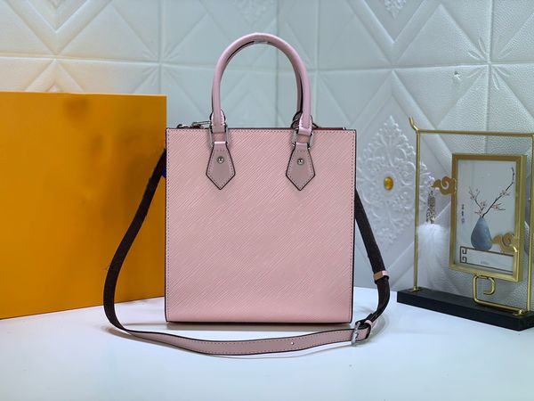 Bolsa tote elegante rosa blush 2024 - acabamento em couro com alça marrom contrastante, detalhes prateados e interior espaçoso para estilo profissional moderno 58659