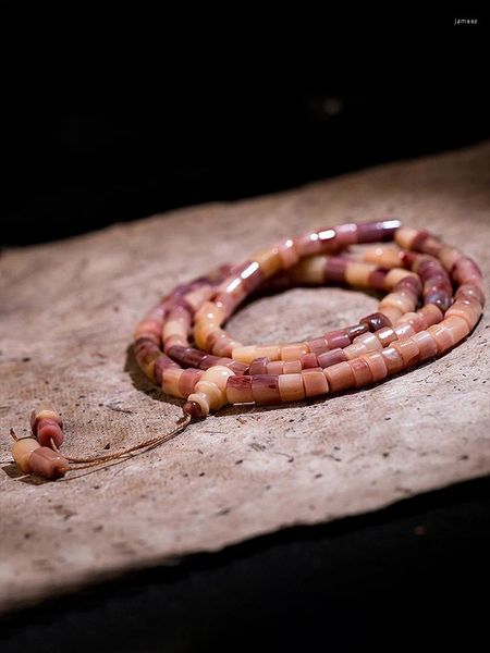 Collana di orecchini con osso di sangue naturale con perline a forma di fette. Bracciale da uomo in stile etnico con rosario lungo