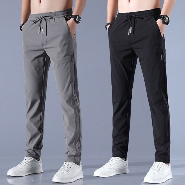 Pantaloni da uomo Primavera Estate Pantaloni da uomo in seta di ghiaccio Larghi e traspiranti Collant da uomo casual dritti Collant sottili ad asciugatura rapida Pantaloni sportivi da uomo elastici 230407