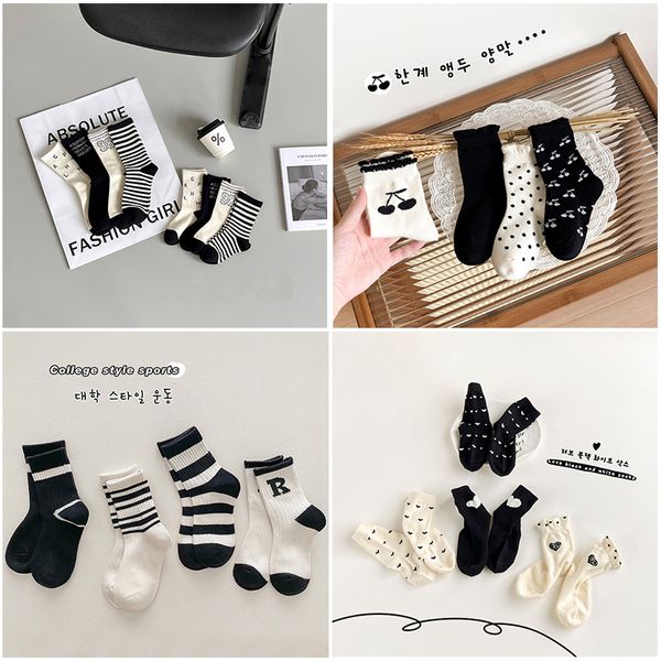 Designer Design Wave Point Kleinkinder Baby Hochwertige Jungen Mädchen Mode Große Kinder Atmungsaktive Baumwollsocken Schwarz-weiß gestreifte Kinder-Mittelrohrsocken