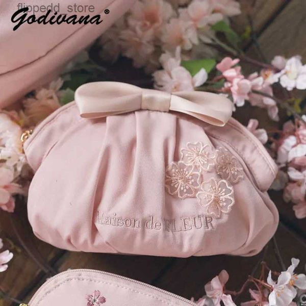 Косметички Японская серия Cherry Blossom Hand Hold Dumpling Bag Girls Симпатичный розовый мини-клатч Женская атласная косметичка с бантом Q231108