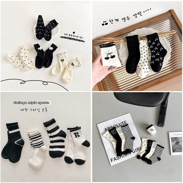 Designer Wave Point Kleinkinder Baby Hohe Qualität Neue Jungen Mädchen Mode Große Kinder Atmungsaktive Baumwollsocken Schwarz-weiß gestreifte Kinder-Mittelrohrsocken