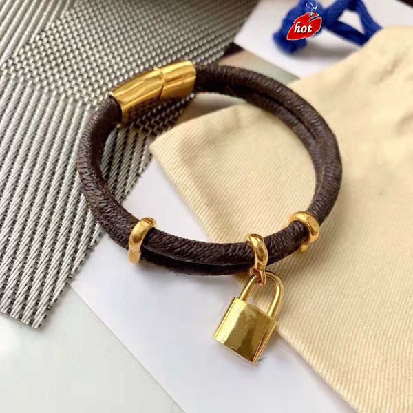 Pulseira de grife mulher Manwith Brand Luxury Jewelry Leather Bracelet com metal Lock Head Charm Bracelets de moda sofisticada Casal de moda 7qxl