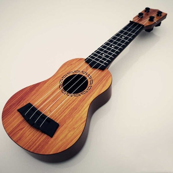 Mini guitarra de guitarra 4 Strings clássicos Ukulele Guitar Toy Musical Instruments for Kids Beginners Early Education Ukulele