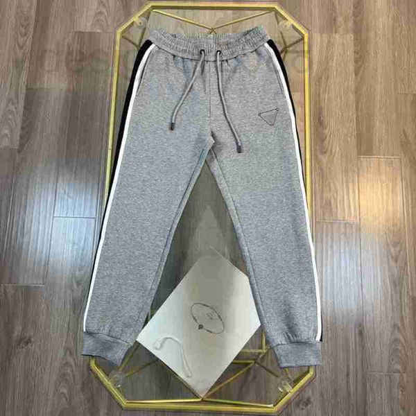 Pantaloni da uomo Designer Autunno Nuovo Gram Lettera Triangolo Logo Pantaloni piedi casual 20EL