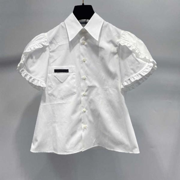 2023 nuova maglietta da donna di design di fascia alta Academy Triangle Label Blossom White Shirt Summer Small Style Design Sense Sleeve Top