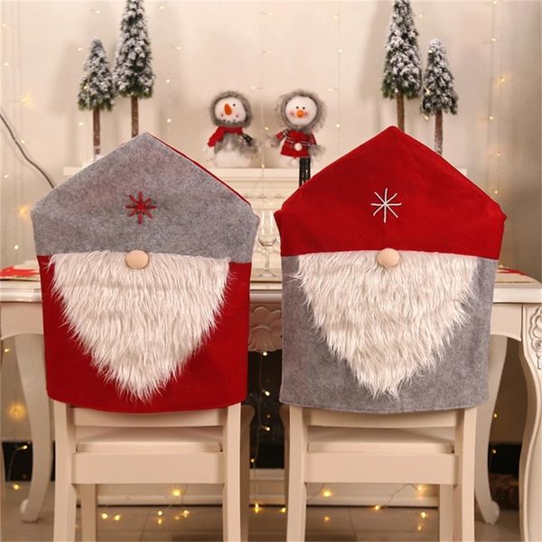 Coprisedie Coprisedie natalizie Simpatico cartone animato Cappello da Babbo Natale Sedia da pranzo Decor Cover Decorazione festiva Festa nuziale Bomboniera 231110