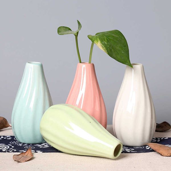 Vasi 1pcs piccoli vasi artigianato in ceramica Creative Office Casa Desktop Decorativo Bottiglie di aromaterapia in ceramica BOTTULE ASSICI