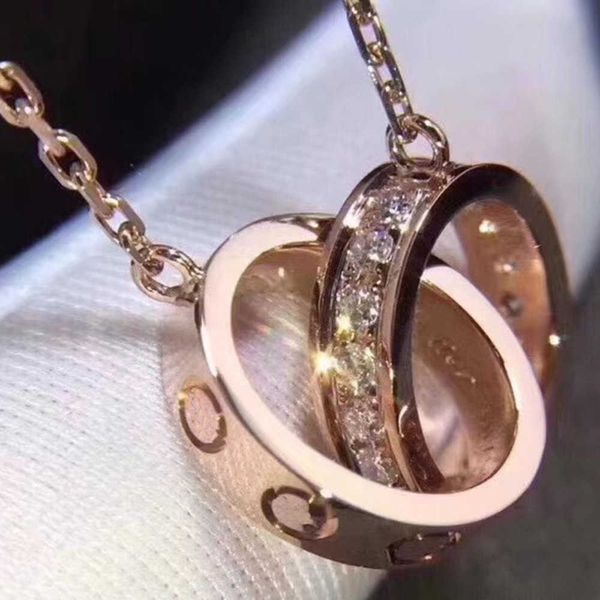 Collana di moda di lusso Designer Gioielli per feste Ciondolo in argento sterling con doppi anelli Collane in oro rosa per gioielli da donna a catena lunga in maschera