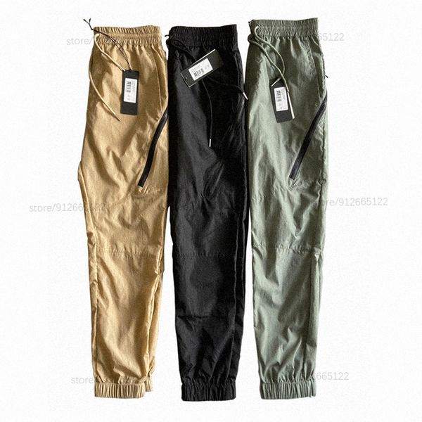 Pantaloni da uomo Pantaloni casual impermeabili in nylon da uomo di alta qualità primaverili e autunnali lenti ad asciugatura rapida pantaloni sportivi decorativi pantaloni da viaggio 230412