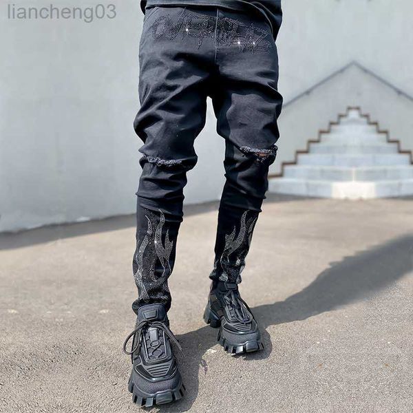 Jeans da uomo 2023 Jeans strappati da uomo Jeans skinny Jeans elasticizzati neri Pantaloni a matita in denim MAN Denim Street Punk Pantaloni da motociclista slim fit W0413