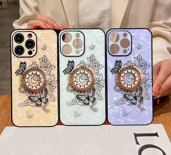 Custodie per porta diamanti Tybomb Butterfly Bling per Iphone 15 14 Plus 13 Pro Max 12 11 Orologio di lusso Fiore PC rigido in plastica TPU Strass 360 Anello per dito Copertura per cavalletto