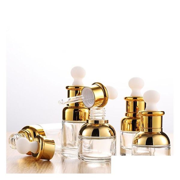 Bottiglie di imballaggio Flacone contagocce in vetro oro all'ingrosso 20 30 Bottiglie di siero di lusso da 50 ml con tappo Shinny per olio essenziale Dh3133 Drop Deli Dheta