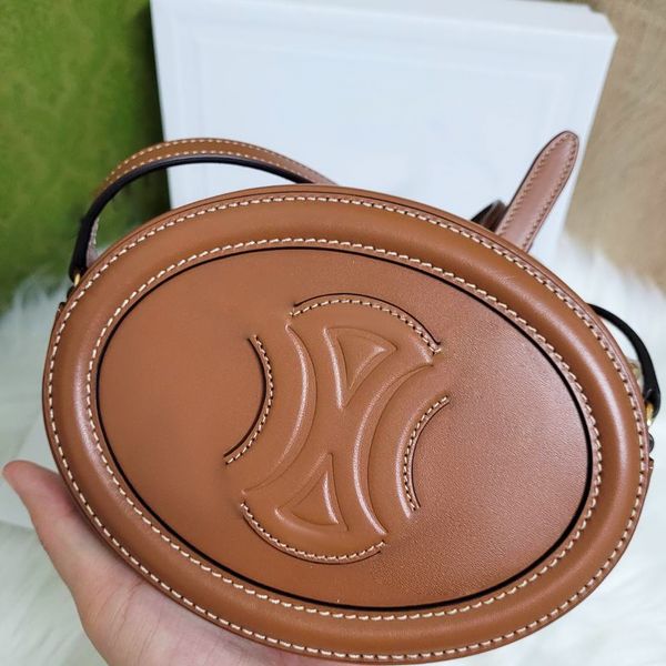 Damen Luxuriöses, glattes Kalbsleder „TRIOMPHES Celiny“, ovale Tragetasche, Umhängetasche, echtes Leder, Herrenhandtaschen, Umhängetaschen, Clutch-Taschen, Designer-Turnhalle, Mini-runde Hobo-Tasche mit Prägung