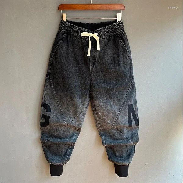 Jeans da uomo Autunno Uomo Piedi larghi larghi Stampa di lettere di moda elastica Pantaloni Haren casual a nove punti di marca Pantaloni maschili Homme