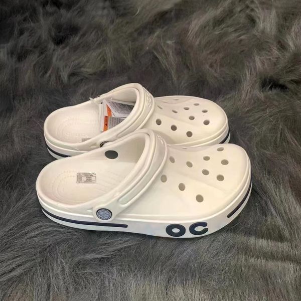 2024 Nuovi scarpe casual designer CRO Outdoors cursori intasati con maschere da donna da donna Triple scarpe per bambini bianchi bianchi scarpe da sandalo piatto da goccia per neonati sandale scivoli
